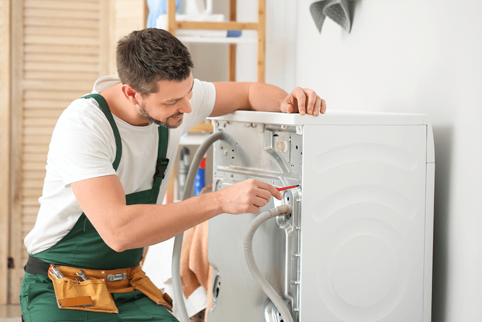 Panasonic washing machine water inlet valve replacement in Al Qusais residential area